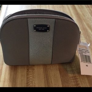 Brand new Michael Kors large travel pouch